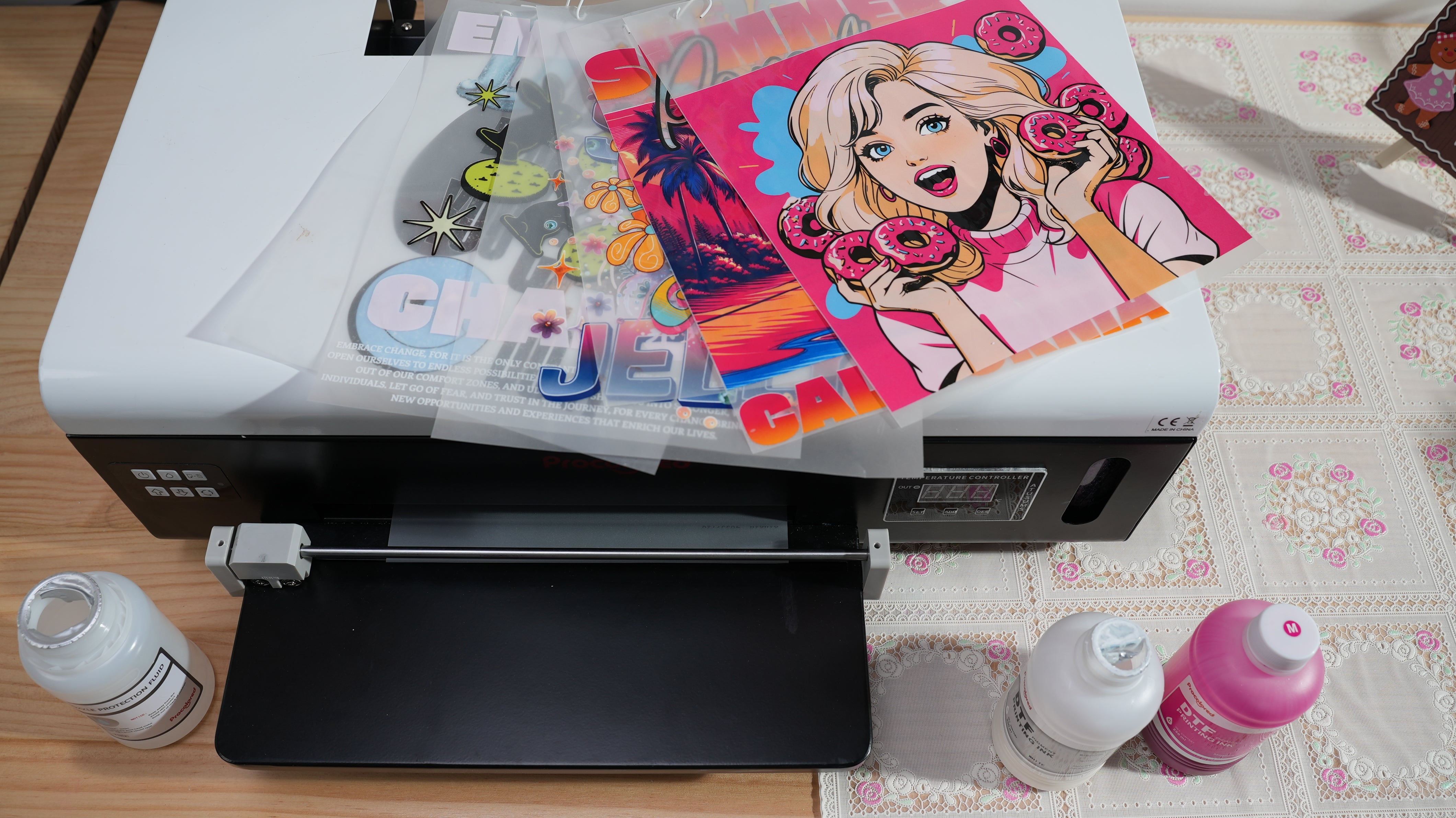 DTF printer applying colorful ink onto PET film for custom apparel transfers.