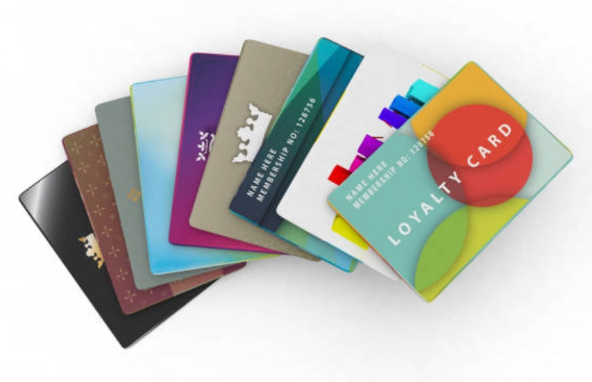 DTF printer applying colorful ink onto PET film for custom apparel transfers.